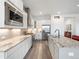 Spacious kitchen with stainless steel appliances, ample counter space, and modern cabinetry at 5681 Water Avens Dr, Castle Rock, CO 80104
