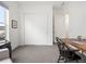 Well-lit office space with desk, chair, and closet, perfect for productivity at 5681 Water Avens Dr, Castle Rock, CO 80104