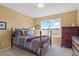 Inviting bedroom with ample natural light and views of the surrounding landscape at 5686 Brook Hollow Dr, Broomfield, CO 80020