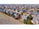 Aerial view of a residential neighborhood showcasing well-maintained homes, mature trees, and a serene environment at 5686 Brook Hollow Dr, Broomfield, CO 80020