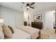 This bedroom features neutral colors, large closets and updated furniture at 1765 S Kline Way, Lakewood, CO 80232