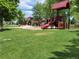 A vibrant playground with multiple slides, climbing structures, and recreational features at 1765 S Kline Way, Lakewood, CO 80232
