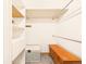 Walk-in closet with built-in shelving, providing ample storage and organization options at 8777 W Cornell Ave # 2, Lakewood, CO 80227