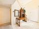 Inviting foyer with a display cabinet, tiled flooring, and ample natural light at 8777 W Cornell Ave # 2, Lakewood, CO 80227