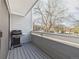 Private patio with grill and outdoor seating, perfect for enjoying outdoor meals at 8777 W Cornell Ave # 2, Lakewood, CO 80227