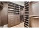Large walk-in closet with ample shelving and hanging space at 6561 S Harlan Ct, Littleton, CO 80123