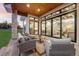 View of the living area from the covered patio at 6561 S Harlan Ct, Littleton, CO 80123