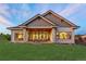 Stunning house exterior with a large backyard and covered patio at 6561 S Harlan Ct, Littleton, CO 80123