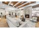 Elegant living room features hardwood floors, fireplace, and high ceilings at 6561 S Harlan Ct, Littleton, CO 80123