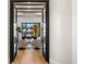 Bright home office with large windows and wood floors at 6561 S Harlan Ct, Littleton, CO 80123