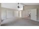 Large bedroom showcasing ample closet space and a view to the kitchen and bathroom at 11245 San Joaquin Rdg, Littleton, CO 80127