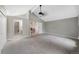 Expansive bedroom with ensuite bath access and a view to the loft at 11245 San Joaquin Rdg, Littleton, CO 80127
