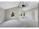 Spacious primary bedroom featuring a vaulted ceiling, three closets, and plenty of natural light at 11245 San Joaquin Rdg, Littleton, CO 80127