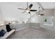 Upstairs loft featuring an open floor plan, creating a versatile and inviting space at 11245 San Joaquin Rdg, Littleton, CO 80127