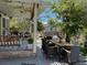 Outdoor patio with comfortable seating and dining area perfect for enjoying meals and entertaining at 11245 San Joaquin Rdg, Littleton, CO 80127