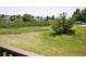 View of a vibrant green backyard with lush vegetation, offering a serene and private outdoor space at 17361 E Mansfield Ave # 521R, Aurora, CO 80013