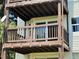 Balcony of a home featuring dark brown railings at 17361 E Mansfield Ave # 521R, Aurora, CO 80013