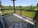 Relaxing balcony with comfortable furniture overlooking a lush green field at 17361 E Mansfield Ave # 521R, Aurora, CO 80013