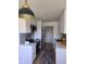 Modern kitchen featuring stainless appliances, white cabinetry, and elegant countertop finishes at 17361 E Mansfield Ave # 521R, Aurora, CO 80013