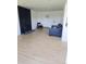 Clean living room featuring a fireplace, modern flooring, and contemporary furnishings at 17361 E Mansfield Ave # 521R, Aurora, CO 80013