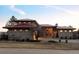 Beautiful two-story home with a red roof and manicured front yard at 24360 E Glasgow Dr, Aurora, CO 80016