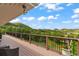 Expansive deck with scenic views of rolling hills and clear blue skies, perfect for outdoor enjoyment at 1380 Oak Valley Rd, Sedalia, CO 80135