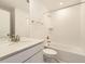 Clean bathroom featuring a vanity with a marble countertop, tub and shower combination at 39886 Floyd St, Elizabeth, CO 80107