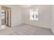 Cozy bedroom with soft carpet, neutral walls and a large window for natural light at 39886 Floyd St, Elizabeth, CO 80107