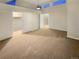 Main bedroom with carpeted floors and walk in closet at 17054 E Tennessee Dr # 212, Aurora, CO 80017