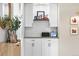 Elegant cabinets with white subway tile backsplash, stylish decor, and neutral color scheme at 9220 Yucca Way, Thornton, CO 80229