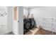 Laundry room with modern black washer and dryer, ample space, and practical design at 9220 Yucca Way, Thornton, CO 80229