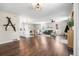 Spacious open concept living space with hardwood floors, modern decor, and lots of natural light at 9220 Yucca Way, Thornton, CO 80229
