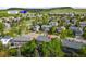 Neighborhood view of a home situated near recreational amenities with lush greenery and mountain views at 7837 Aravon Ct, Lone Tree, CO 80124