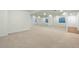 Mirrored wall in the basement enhances the space and reflects natural light in this bonus room at 7837 Aravon Ct, Lone Tree, CO 80124