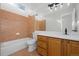 Bathroom with tiled shower and floor, sink vanity, and other bathroom fixtures at 7837 Aravon Ct, Lone Tree, CO 80124