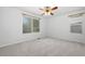 An empty bedroom featuring carpet flooring, natural light, and neutral paint at 7837 Aravon Ct, Lone Tree, CO 80124
