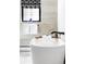 Inviting bathroom showcasing a freestanding tub and elegant fixtures at 121 S Ivy St, Denver, CO 80224