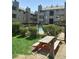 Picnic table with benches in a condo community at 3100 S Federal Blvd # 203, Denver, CO 80236