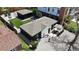 Aerial view of quaint black home, showing gravel yard, and outdoor entertaining space at 640 N Magnolia St, Denver, CO 80220