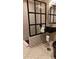 Modern bathroom featuring an elegant sink, shower with patterned tile, and stylish fixtures at 640 N Magnolia St, Denver, CO 80220