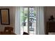 Bright dining room with view to patio and outdoor umbrella for sunny days at 640 N Magnolia St, Denver, CO 80220