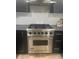 Close-up of the stainless steel Viking oven, contrasting the black cabinets and modern countertop at 640 N Magnolia St, Denver, CO 80220