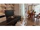 Home office with an adjacent dining room featuring hard wood floors and natural light at 640 N Magnolia St, Denver, CO 80220