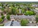 Aerial shot showing well-maintained townhomes in a desirable location, surrounded by mature trees at 3712 Wolff St, Denver, CO 80212