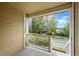 Covered porch featuring a view of a tree-lined street and neighborhood at 3712 Wolff St, Denver, CO 80212