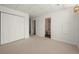 Spacious basement with carpet, white walls, and a bathroom at 3712 Wolff St, Denver, CO 80212