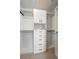 Custom walk-in closet with modern storage solutions, drawers, and shelving at 3712 Wolff St, Denver, CO 80212
