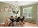 Charming dining room with hardwood floors and ample natural light at 3712 Wolff St, Denver, CO 80212
