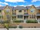 Attractive townhomes with inviting entrances, complemented by beautiful landscaping at 3712 Wolff St, Denver, CO 80212