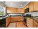 Well-maintained kitchen with stainless steel appliances and granite countertops at 3712 Wolff St, Denver, CO 80212
